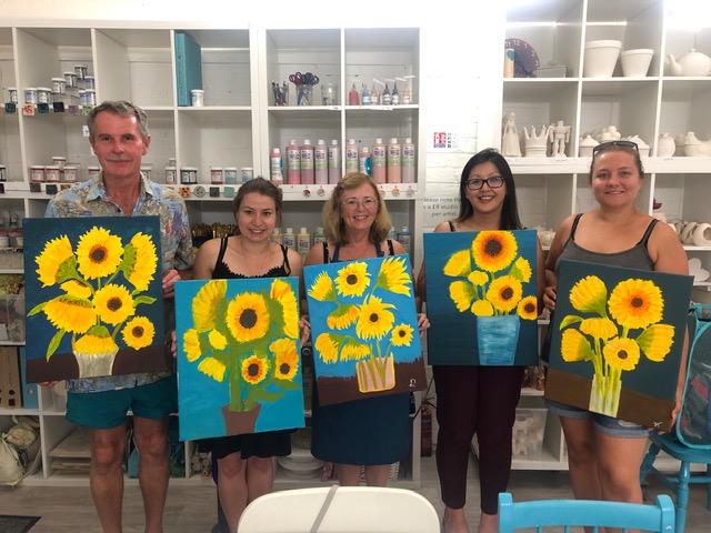 artists sharing their artwork from Chrissie Richards art class five paintings of sunflowers