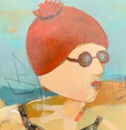 swimmer in red bobble hat and quirky glasses