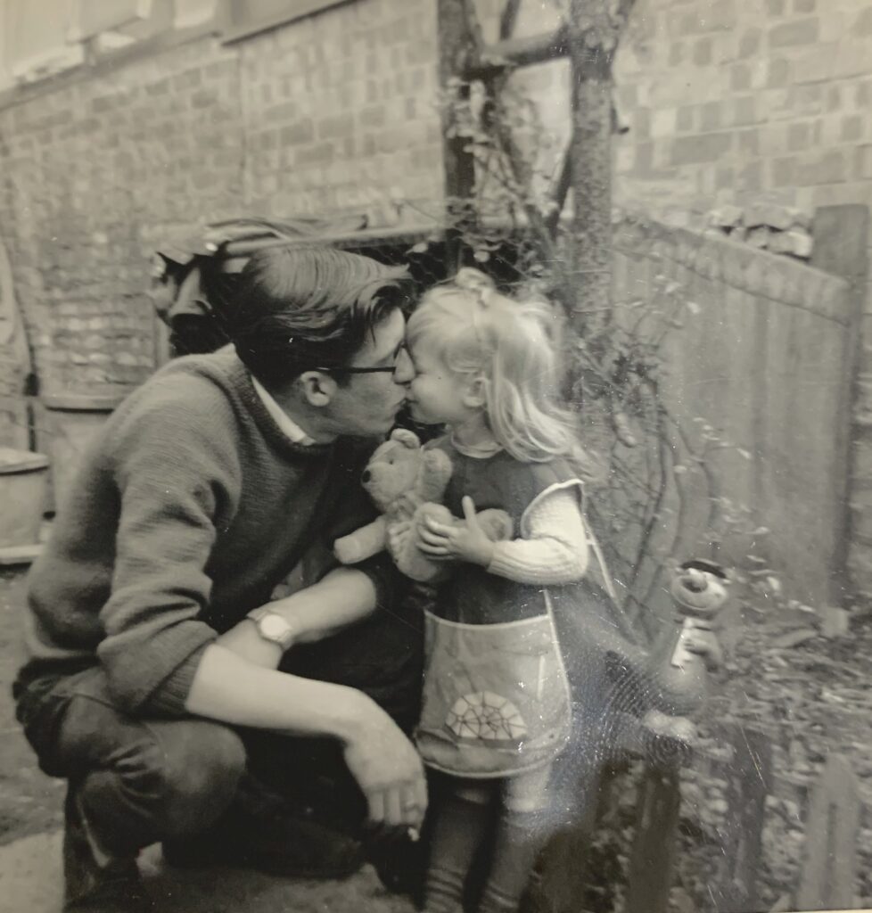 black and white photo of man and girl