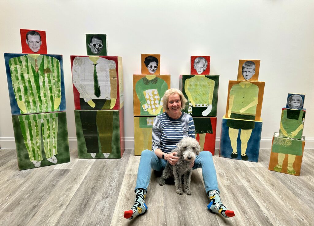 cardboard box sculpture with artist Chrissie Richards and dog